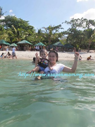 cute filipino mom and little boy at the beach mom and kid at the beach