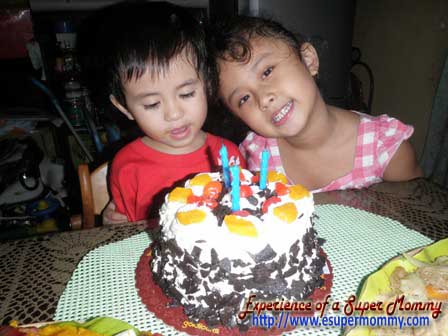 Filipino boy with birthday cake